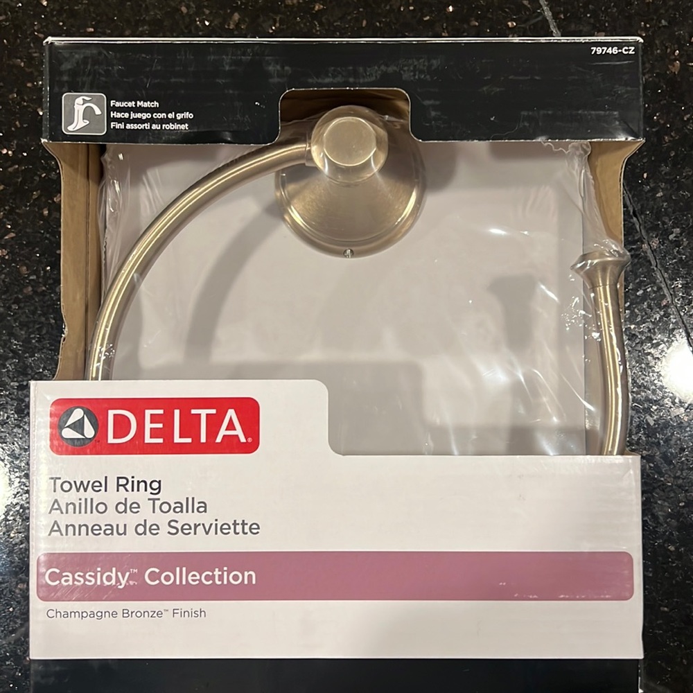 Towel ring by Delta faucet. Champagne bronze.